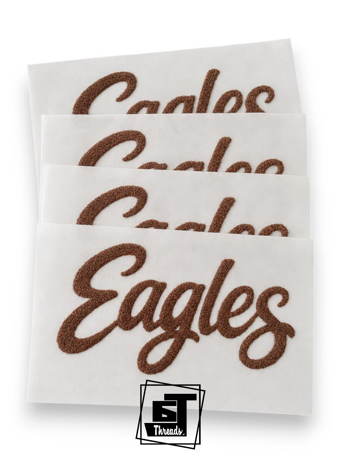 fuzzy brown eagles cursive word patch on a white background