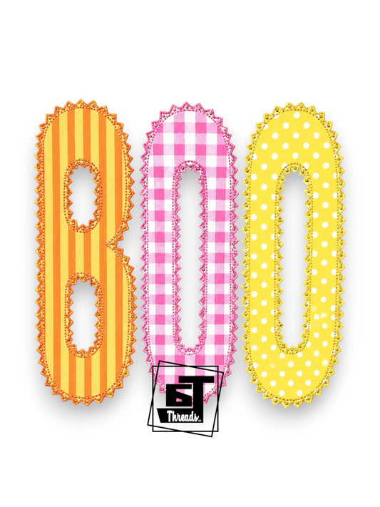 Three decorative letter-shaped numbers spelling 'BOO' on a white background: an orange and yellow striped '8', a pink and white gingham 'B', and a yellow polka-dot 'O', with a small 'ST Threads' logo badge centered below.