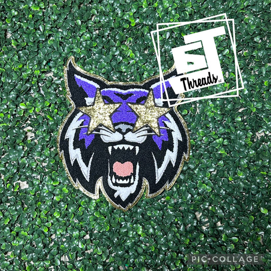 purple, black, and white chenille with gold glitter back