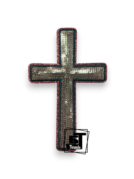 Measurements: 3.5 inches wide by 5 inches tall
Gold sequin cross patch with black embroidery and orange glitter background
Iron-on patch