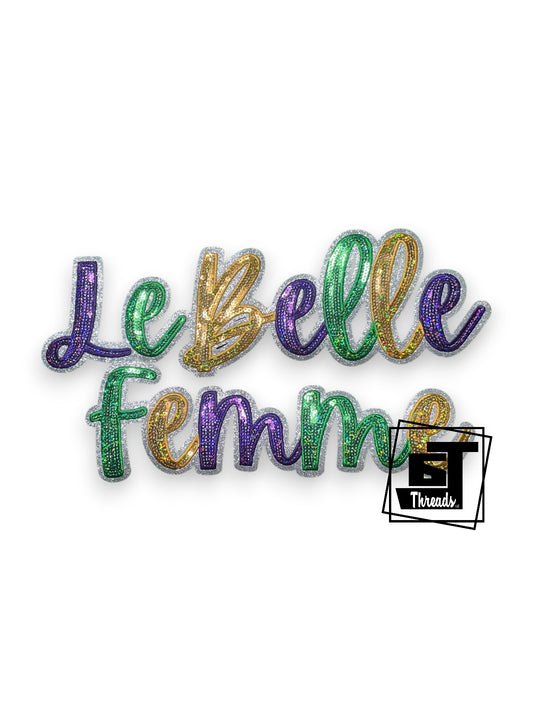 Measurements: 12 inches wide by 6 inches tall
Multicolored cursive sequin Le Bella Femme with multicolored embroidery and silver glitter backgorund
iron-on Patch