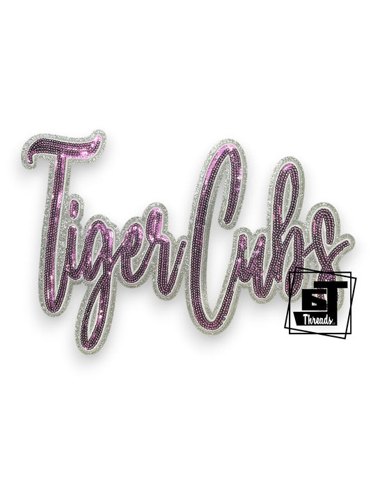 Measurements: 11 inches wide by 8 inches tall
Purple cursive sequin Tiger Cubs patch wiith white embroidery and silver glitter backgorund
Iron-on Patch