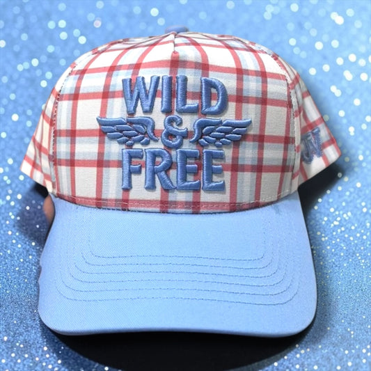 Plaid cap with 'Wild & Free' text on a blue background