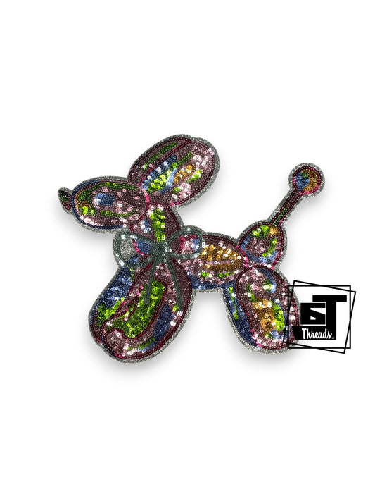 Measurements 10 inches wide by 9 inches tall
Sequin multi-colored ballon anmal with bow and A SILVER GLITTER BACKGROUND
Iron=on Patch