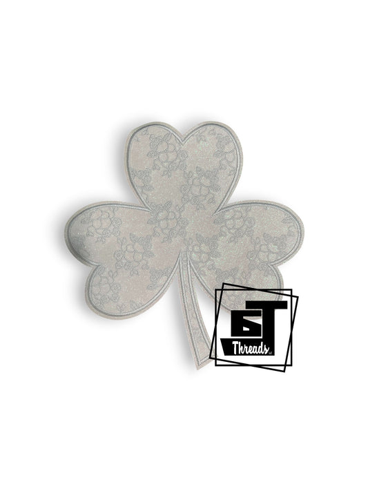Measurements: 10 inches wide by 10.5 inches tall
White fabric glitter clover patch with white embroidery and white glitter background
Iron-on Patches