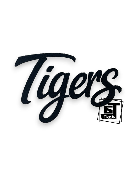 Measurements 10.5 inches wide by 8 inches tall
Black Cursive fluffy fabric Tigers
Iron-on Patch