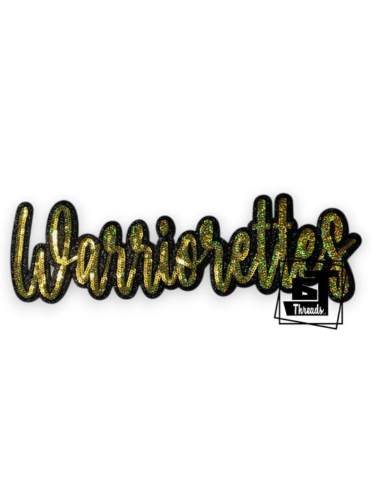 Measurements: 12 inches wide by 3.5 inches tall
Gold cursive sequin Warriorettes patch with black embroidery and a black glitter background
Iron-on Patch