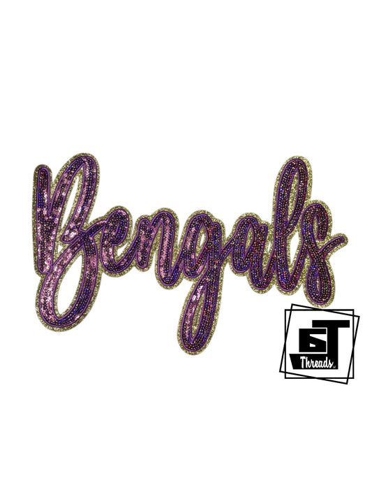 Measurements: 12 inches wide by 8 inches tall
Purple and Gold cursive sequin Bengals with purple embroidery and gold glitter background
Iron-on Patch