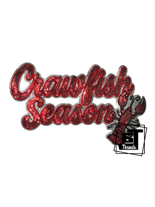 Measurements 10 inches wide by 6 inches tall
Red cursive sequin crawfish season with red embroidery and a silver glitter background
Iron-on Patch