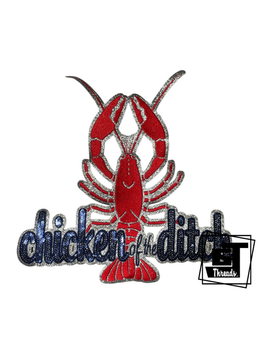 Measurements: 10 inches wide by 10 inches tall&nbsp;
Blue and red cursive sequin Chickens of the Ditch patch with red and blue embordery and a silver glitter background
Iron-on Patch