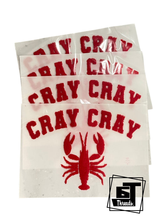 Three white stickers with red 'Cray Cray' text and a lobster graphic, on a white background.