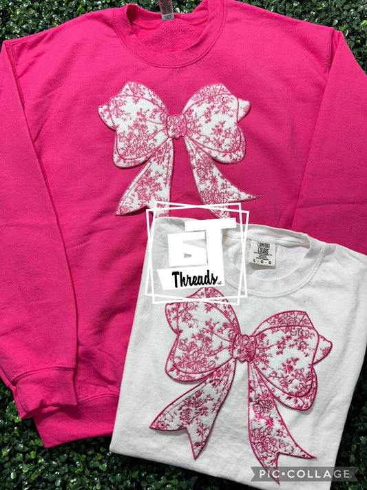 Pink floral bow on a dark pink crewneck
