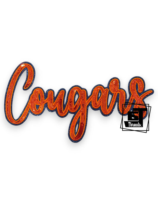 Embroidered patch with 'Cougars' text in orange and blue on a white background