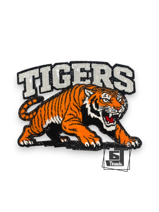 Tigers logo patch with a roaring tiger and 'TIGERS' text on a white background.