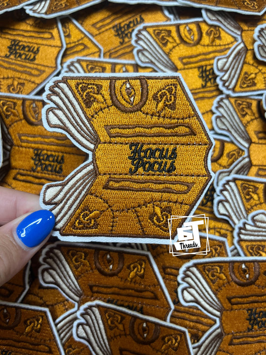 Book with Eyes cap patch