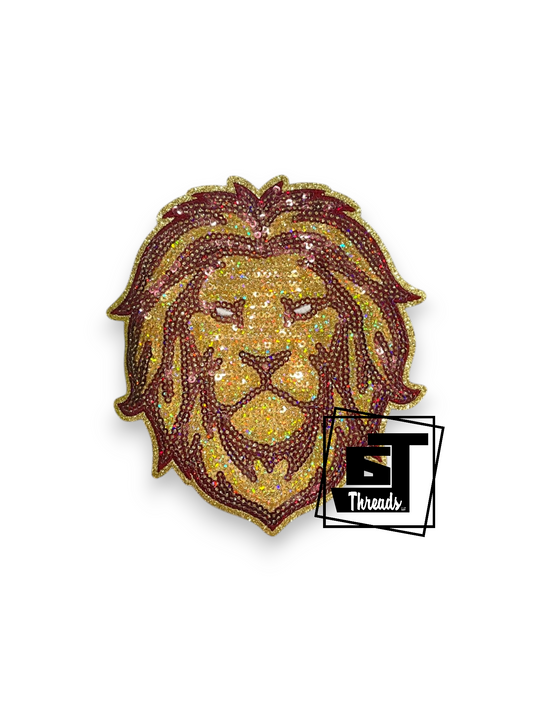 Gold and red lion head patch with 'ST Threads' logo on a white background