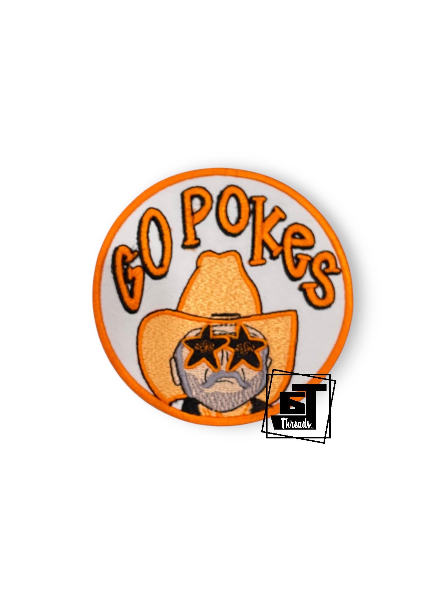 A circular embroidered patch featuring the text 'GO POKES' in orange above a cowboy hat with a bearded face wearing star-shaped glasses. A small 'GT Threads' logo is overlaid near the bottom right of the patch.