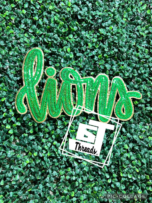 green and gold cursive sequin lions iron on patch