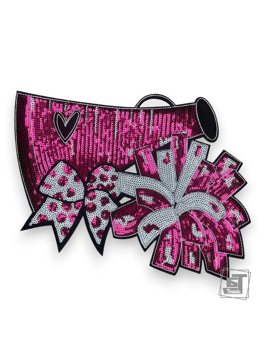 Pink and silver cheerleading bow with sequins on a white background