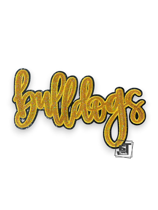 Embroidered patch with 'Bulldogs' text in gold on a white background