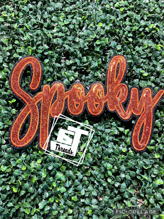 Orange Cursive Sequin Spooky iron on patch