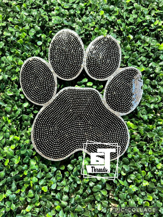 Decorative rhinestone paw print on a green grass background with 'EJ Threads' branding.