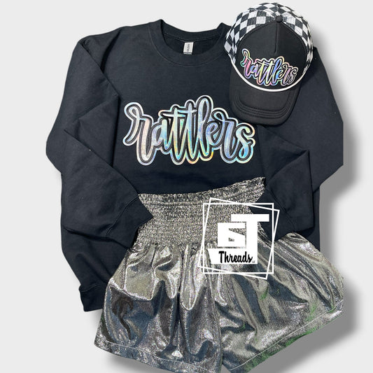 Silver metallic rattler patch on a black sweatshirt