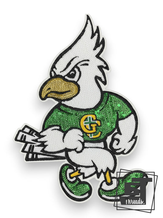 Measurements 7 inches wide by 10 inches tall
Green, white, and gold sequin mascot eagle patch
Iron-on Patch