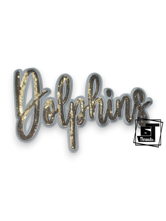 Decorative patch with 'Dolphins' text and sequin design on a white background