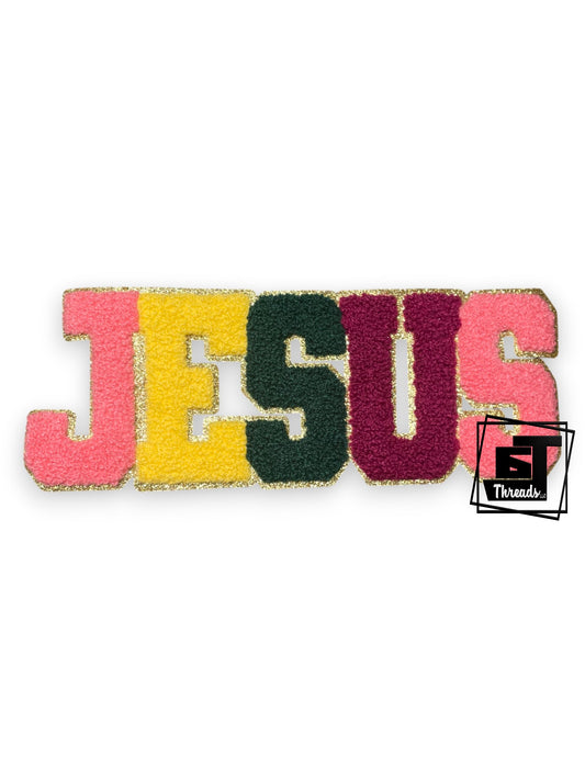 Colorful patch with 'JESUS' text on a white background