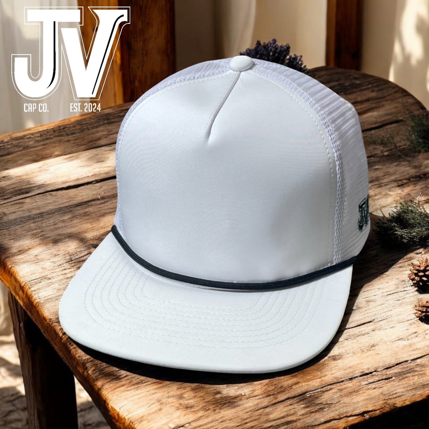 jv white cap with black rope