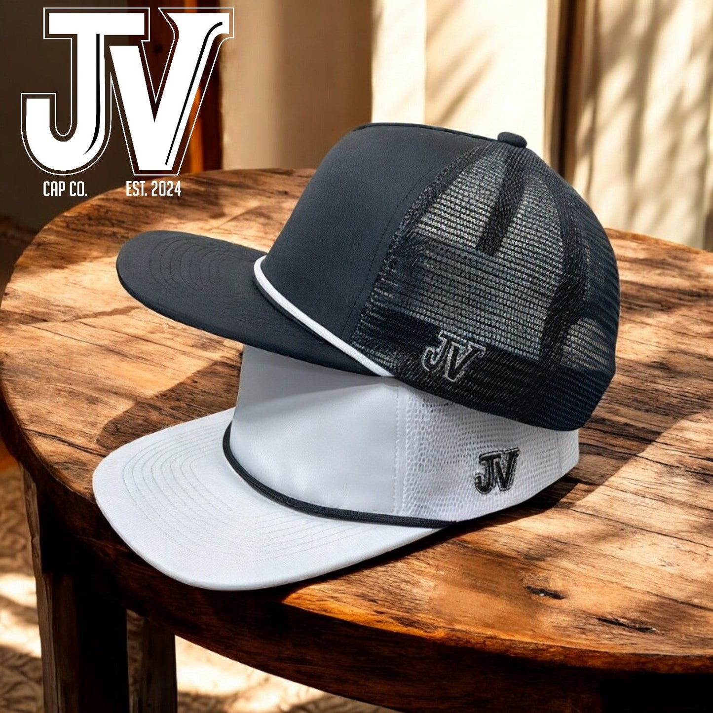jv black cap with white rope and jv white cap with black rope