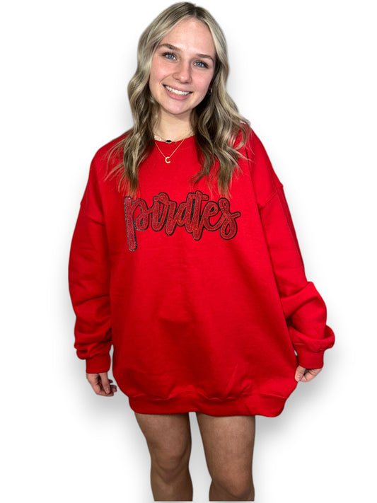Person wearing a red sweatshirt with text on a white background