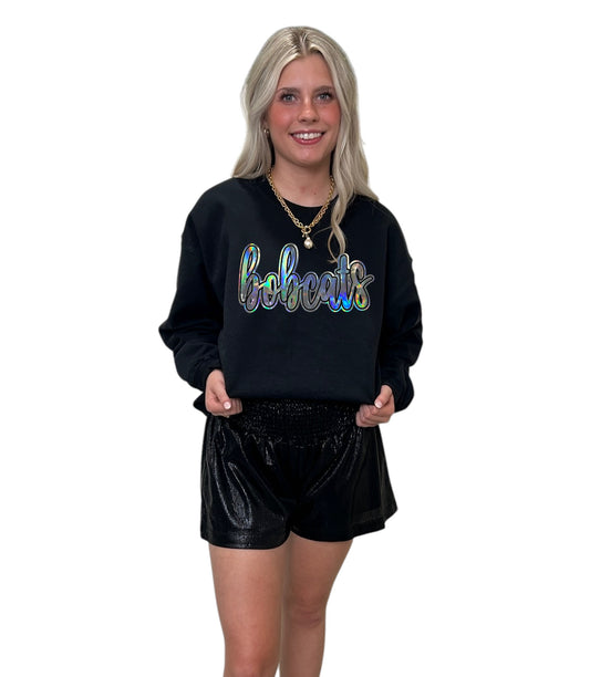 Silver Cursive Metallic Bobcats on black sweatshirt