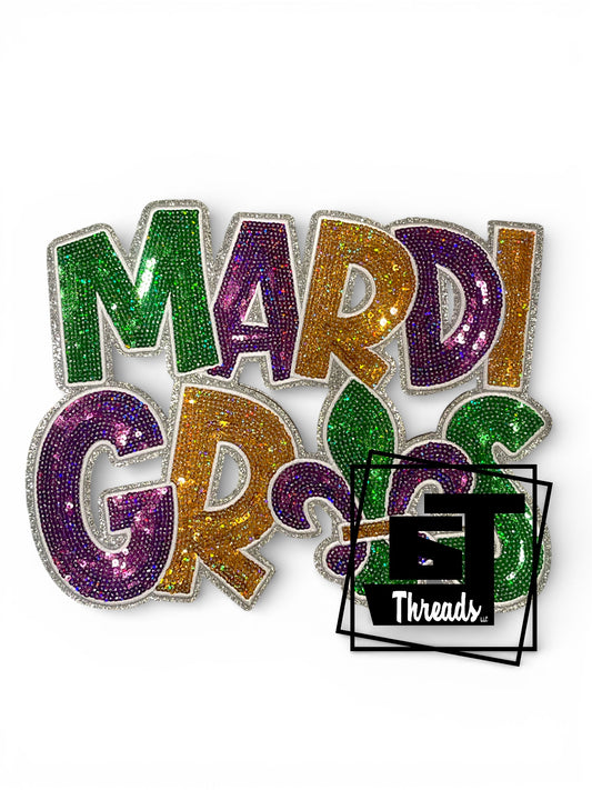 Colorful 'Mardi Gras' text with 6j Threads logo on a white background