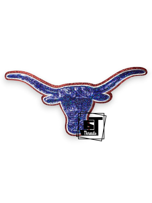 Measurements: 12 inches wide by 5 inches tall
Blue and Red sequin bull head with silver embroidery and red glitter background
Iron-on Patch